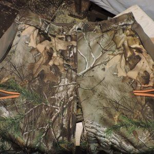 Pair of Field & Stream camo stretch hunting pants men's XL